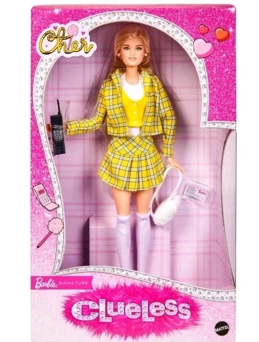 Clueless cher doll 12 inch blonde doll inspired after classic film Clueless. comes with yellow outfit and accessories
